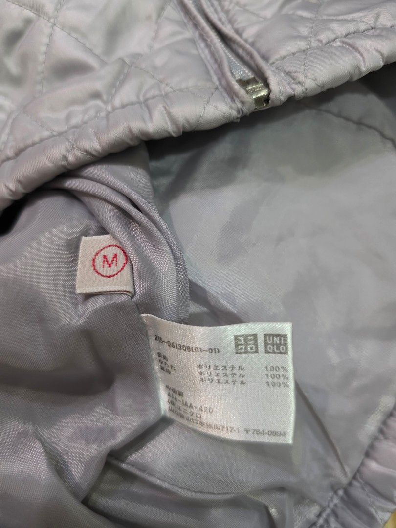 Uniqlo Quilted Jacket with Hood (Category: Coats, Jackets and Outerwear) located in Pasig City. Submitted by chinitafrommanila (Listing ID 1429215723, Image 1). Description: - Uniqlo jacket - Size: M - Quilted design - Hood with adjustable drawstrings - Full zipper closure - Lightweight material - Solid color - Inner lining visible.