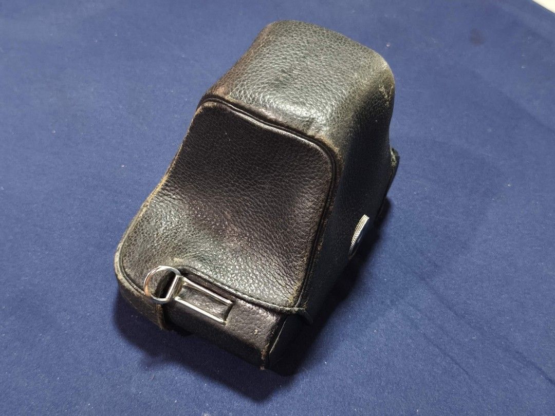 Vintage Camera Case (Category: Camera Bags & Carriers) located in Taguig. Submitted by juliestjuly (Listing ID 1429256838, Image 2). Description: Vintage camera case. The case has a clasp closure and a button closure. The case is marked "JAPAN". It is designed to protect a camera..