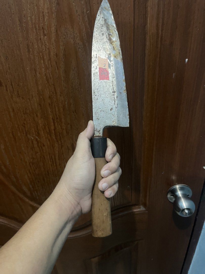 Vintage Japanese Deba Knife. (Category: Knives & Chopping Boards) located in Pasay City. Submitted by beye01 (Listing ID 1429221235, Image 1). Description: Vintage Japanese knife with a wooden handle. The handle is made of wood and has a dark collar. The blade has some markings on it. It is a used item. Blade is about 20cm and handle is about 14cm. Please check out my other items for sale. Thank you..