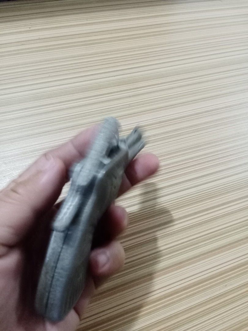 Vintage Metal Toy Gun (Category: Action & Battle Toys) located in Bocaue. Submitted by marajapansurplus (Listing ID 1429293690, Image 3). Description: Vintage metal toy gun. It has a revolver design with intricate details. The gun features a trigger, hammer, and cylinder. It has an "SK" marking on the side. It is a collectible item..