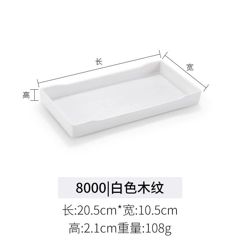 White Rectangular Serving Plate (Category: Other Kitchenware & Tableware) located in Singapore. Submitted by cel96123 (Listing ID 1429182406, Image 2). Description: Elegant white rectangular serving plate. Features a wood grain texture. Dimensions: 20.5cm x 10.5cm x 2.1cm. Perfect for serving snacks, appetizers, or as a decorative piece. Durable and easy to clean..