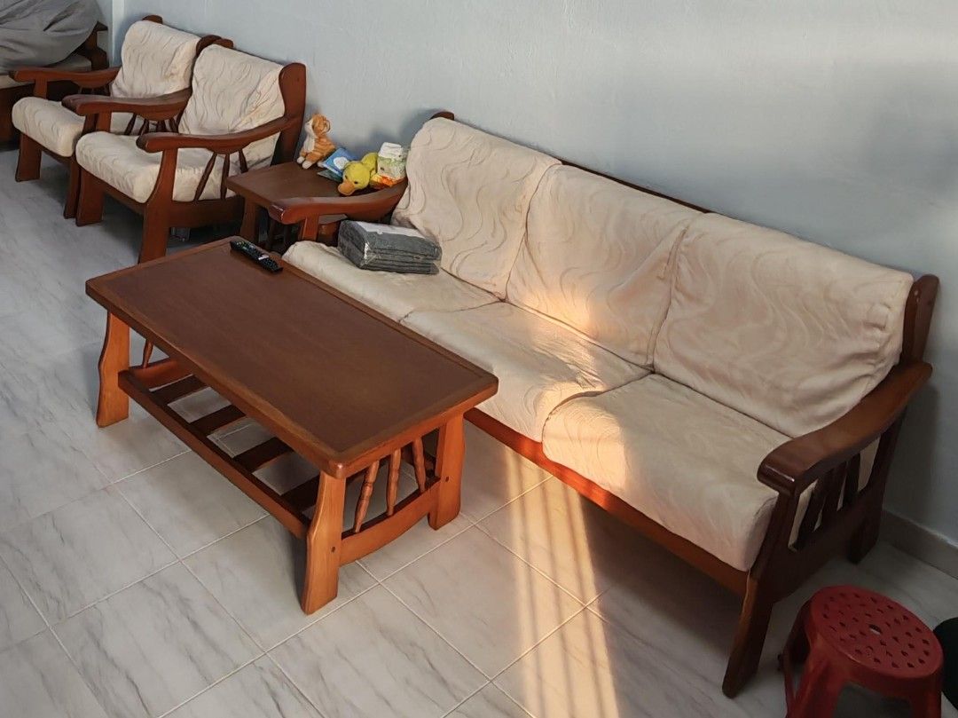 Wooden Sofa Set with Coffee Table (Category: Sofas) located in Singapore. Submitted by .diva.mom. (Listing ID 1429230674, Image 1). Description: Wooden Sofa Set with Coffee Table and side table 3 + 2 seater length : 165cm new cover will be given arrange own transport.