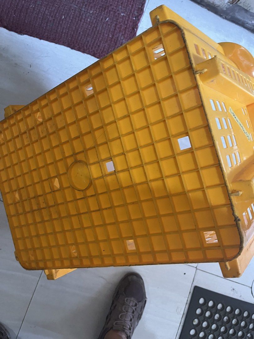 Yellow Plastic Storage Basket crate bin (Category: Storage Boxes & Baskets) located in Pasay City. Submitted by beye01 (Listing ID 1429251442, Image 2). Description: - Durable yellow plastic storage basket - Rectangular shape with grid design - Dimensions: L55cm x W41cm - Built-in handles for easy carrying - Perfect for home or business organization - Sturdy and can hold various items Item is well used but still sturdy. Decluttering. Please check