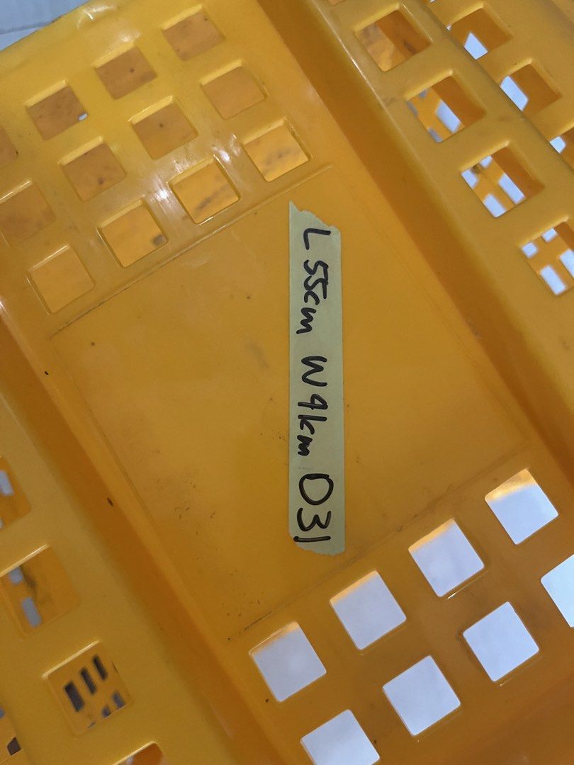 Yellow Plastic Storage Basket crate bin (Category: Storage Boxes & Baskets) located in Pasay City. Submitted by beye01 (Listing ID 1429251442, Image 3). Description: - Durable yellow plastic storage basket - Rectangular shape with grid design - Dimensions: L55cm x W41cm - Built-in handles for easy carrying - Perfect for home or business organization - Sturdy and can hold various items Item is well used but still sturdy. Decluttering. Please check