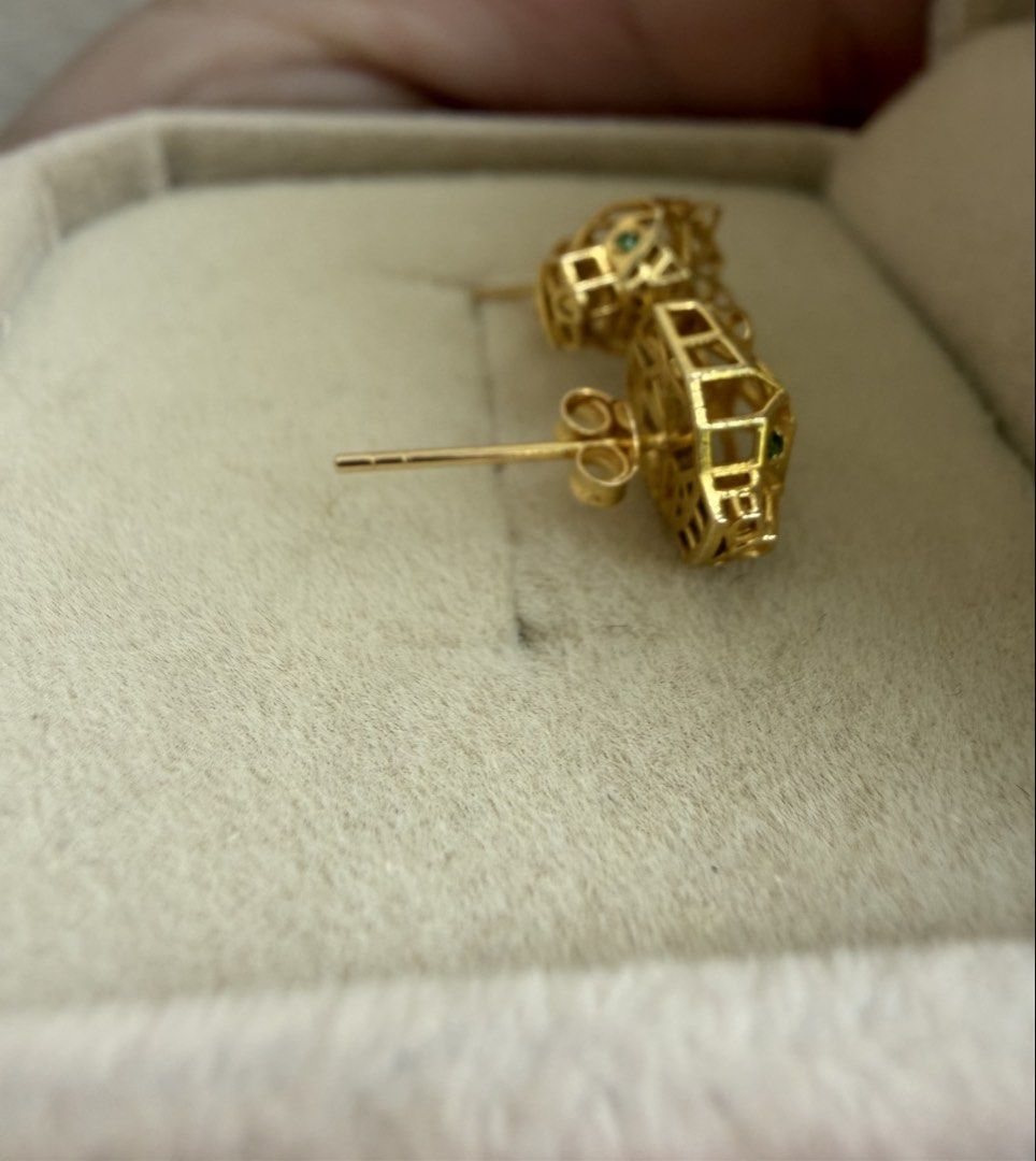 18K Gold Stud Earrings (Category: Earrings) located in Quezon City. Submitted by llimc (Listing ID 1429337118, Image 2). Description: ✨ 18K Gold Stud Earrings panther(?) design✨ • Authentic 18K gold • Approx. 1.1g • With green accent stones • Purchased at Palawan pawnshop Jewelry store Geometric / sculptural design — looks very high-end and stands out when worn 🤍 Lightweight and easy to style for everyday or dressy looks. RFS: Not reaching for i