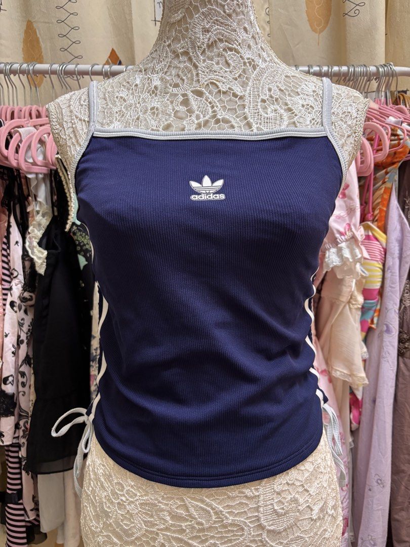 Adidas drawstring tank top (Category: Sleeveless) located in Quezon City. Submitted by kirsten.thrifts (Listing ID 1429481299, Image 1). Description: - XL on tag but runs small - fits small-medium - unclipped at the back.