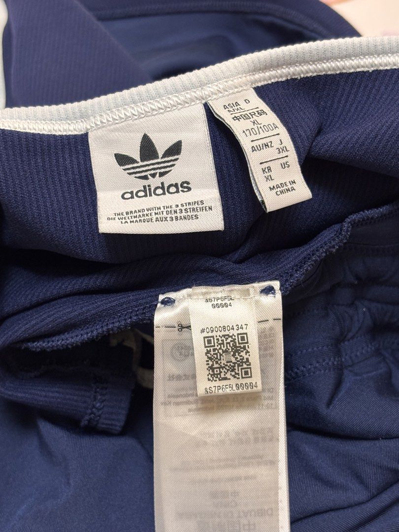 Adidas drawstring tank top (Category: Sleeveless) located in Quezon City. Submitted by kirsten.thrifts (Listing ID 1429481299, Image 3). Description: - XL on tag but runs small - fits small-medium - unclipped at the back.