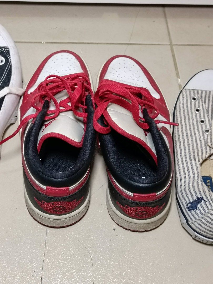 Air Jordan 1 Low - Red White Black (Category: Sneakers) located in Manila. Submitted by monicacheska (Listing ID 1429448628, Image 2). Description: Authentic Nike Air Jordan 1 Low in a classic red, white, and black colorway. Clean silhouette, easy to style—perfect for everyday wear or casual fits. • Size: US 6 (EU 36.5 / 23 cm) • Condition: Used but well-kept (minor creases, still solid overall) • No box included • Original laces (red) • Comforta