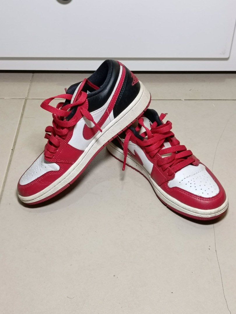 Air Jordan 1 Low - Red White Black (Category: Sneakers) located in Manila. Submitted by monicacheska (Listing ID 1429448628, Image 3). Description: Authentic Nike Air Jordan 1 Low in a classic red, white, and black colorway. Clean silhouette, easy to style—perfect for everyday wear or casual fits. • Size: US 6 (EU 36.5 / 23 cm) • Condition: Used but well-kept (minor creases, still solid overall) • No box included • Original laces (red) • Comforta