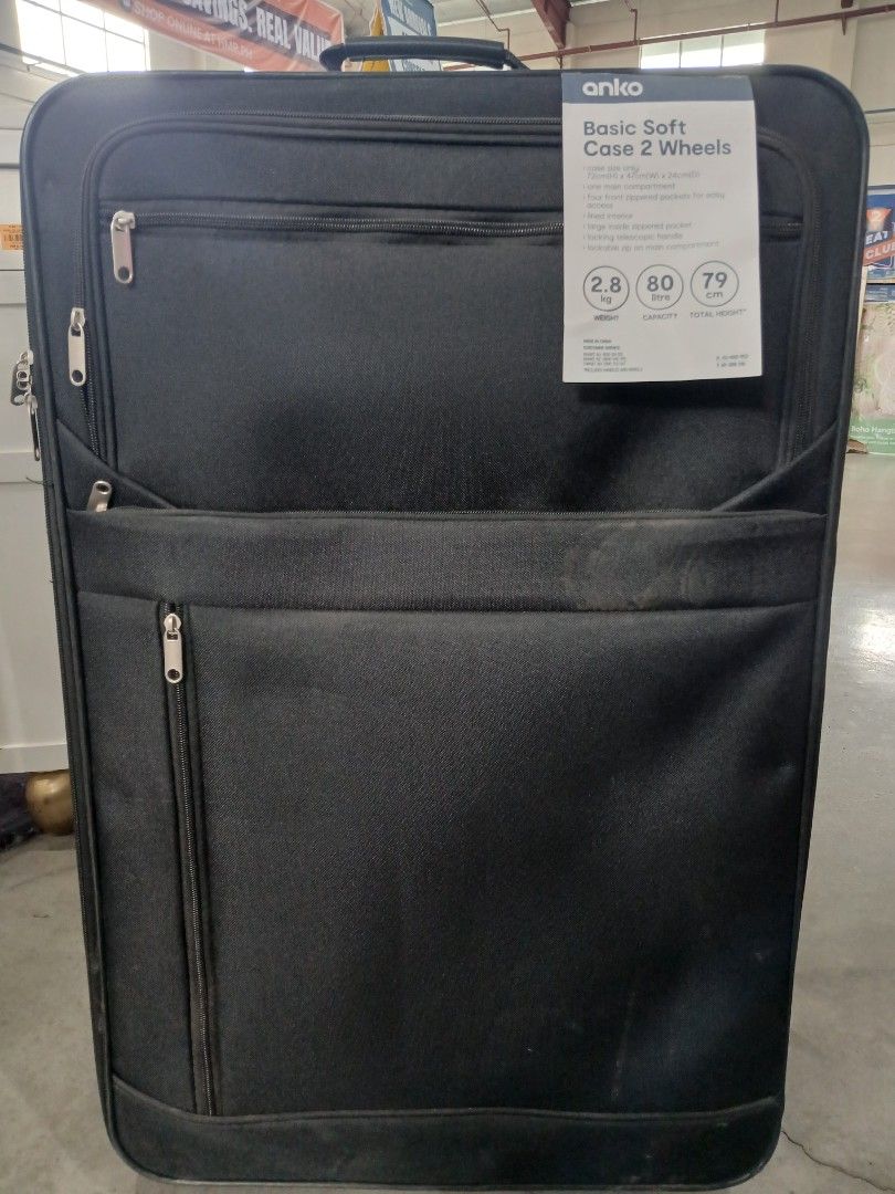 Anko Basic Soft Case 2 Wheels (Category: Luggage) located in Manila. Submitted by sc_arvin (Listing ID 1429371674, Image 1). Description: Black Anko Basic Soft Case with 2 wheels. It has a front pocket with a zipper and a handle on top. The tag indicates a weight of 2.8 kg, and dimensions of 80 x 79 cm..
