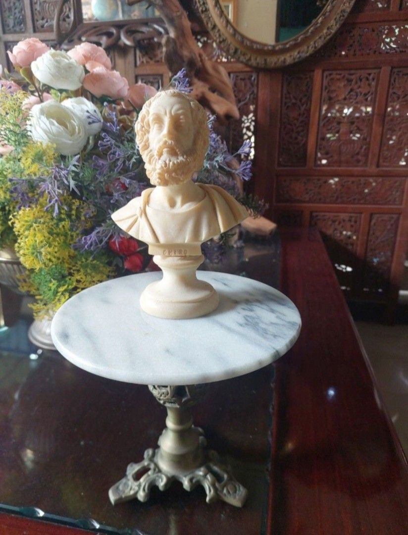Antique Marble Top Mini Table 19th - century (Category: Tables & Sets) located in Bulacan. Submitted by hnbfinds (Listing ID 1426659445, Image 1). Description: This item is a vintage, possibly 19th-century, ornate pedestal table featuring a white marble top with gray veining and a carved brass or bronze base. Style: Often categorized as Gothic-influenced or Hollywood Regency, designed to hold plants, lamps, or small decorative items. Dimensions: 