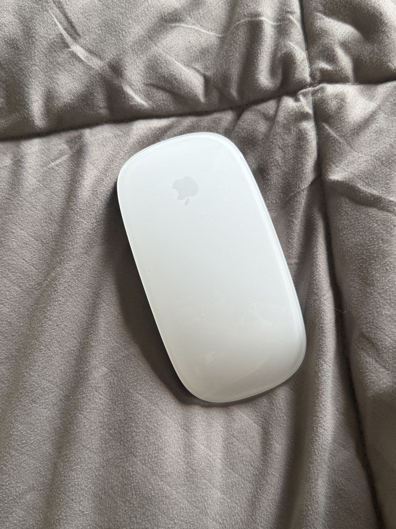 Apple Magic Mouse V2 (Category: Mouse & Mousepads) located in Quezon City. Submitted by leahnnaaaacf (Listing ID 1429406928, Image 1). Description: - This was carefully used - No box na :(.