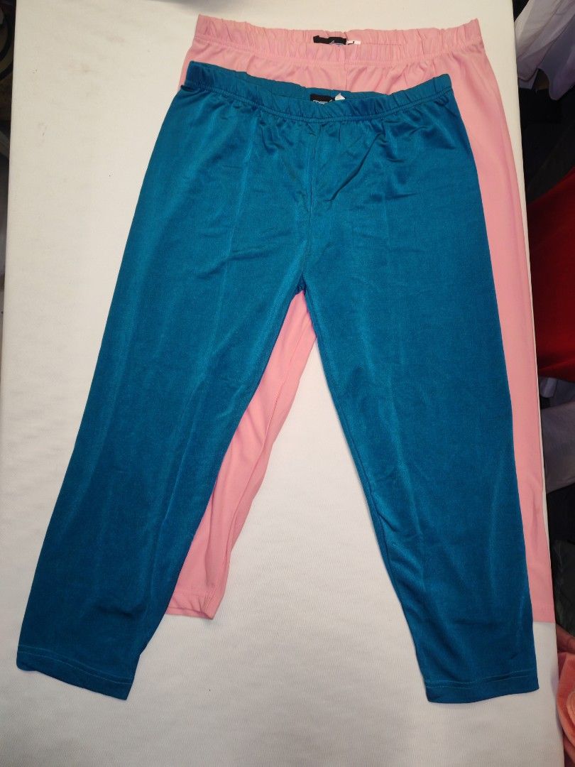 Assorted Color Cropped leggings (Category: Other Bottoms) located in Quezon City. Submitted by rowem (Listing ID 1429488221, Image 3). Description: These pants come in a variety of colors, including black, pink, teal, and light green. They have an elastic waistband and a cropped length. These pants are versatile and can be paired with various tops and shoes for different looks. Available Sizes S/M/L.