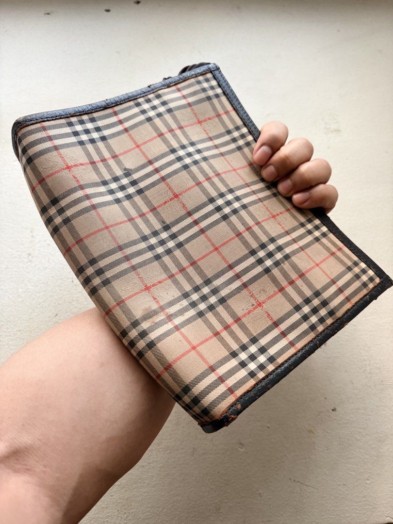 Authentic Vintage Iconic Burberry Clutch Bag (Category: Luxury Bags & Wallets) located in Mandaluyong City. Submitted by material_boi (Listing ID 1429356095, Image 3). Description: Vintage (meaning old) Burberry bought in Japan. In iconic nova check with the horse details. Canvas/fabric outer and full leather inside. Approx 9 inches wide and 7 inches long — can fit small wallet. 2 compartments: 1 sa flap and 1 main. Super nice condition consideri