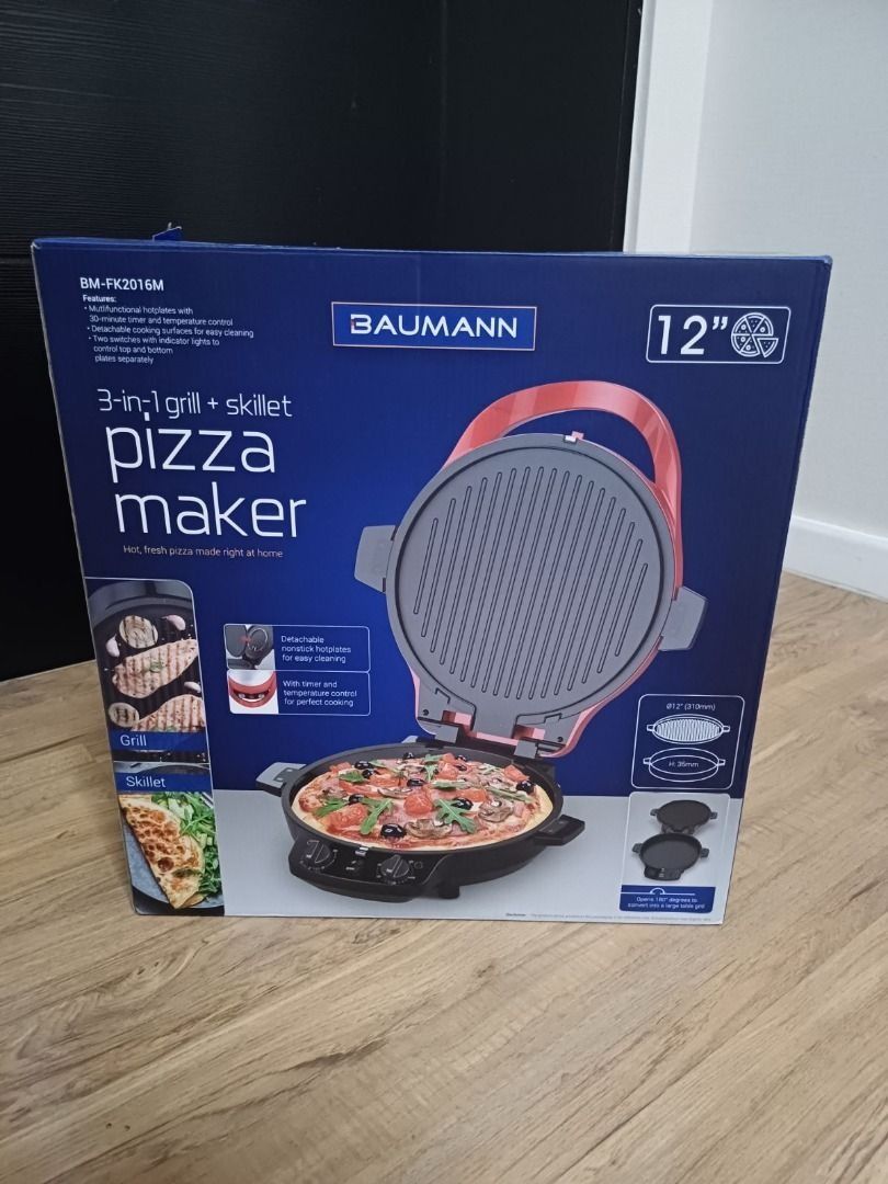 Baumann 3-in-1 Grill + Skillet Pizza Maker (Category: Cookware & Accessories) located in Taguig. Submitted by joey.kim (Listing ID 1429475156, Image 1). Description: Make hot, fresh pizza at home with this Baumann 3-in-1 grill and skillet pizza maker. It features a 12" cooking surface and detachable nonstick plates for easy cleaning. It also includes a timer and temperature control for perfect cooking. This appliance can be used as a grill, skill