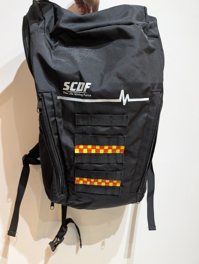 Black Backpack (Category: Backpacks) located in Singapore. Submitted by _allmustgo_ (Listing ID 1429463021, Image 1). Description: - Black backpack - Brand: The Life Saving Force - Features reflective design - Durable material - Spacious interior.