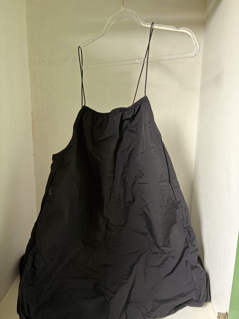 Black Spaghetti Strap Dress (Category: Dresses) located in Pulilan. Submitted by margaretsedit (Listing ID 1429416661, Image 2). Description: Black dress features spaghetti straps and a loose, flowing design. The dress has a gathered neckline and a simple, elegant silhouette. It's a versatile piece suitable for various occasions. Add 62 for SF.