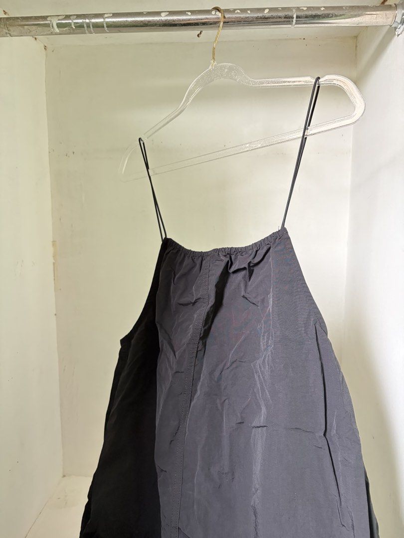 Black Spaghetti Strap Dress (Category: Dresses) located in Pulilan. Submitted by margaretsedit (Listing ID 1429416661, Image 1). Description: Black dress features spaghetti straps and a loose, flowing design. The dress has a gathered neckline and a simple, elegant silhouette. It's a versatile piece suitable for various occasions. Add 62 for SF.