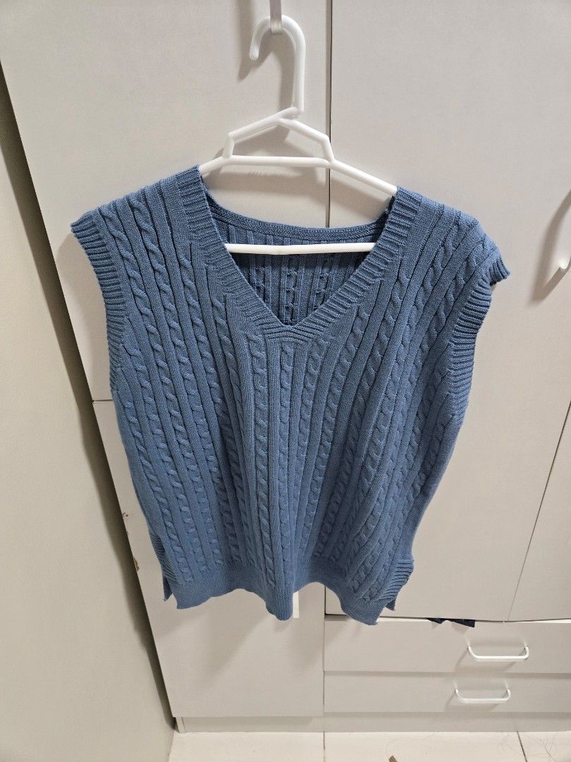 Blue Cable Knit Vest (Category: Vests) located in Bacoor. Submitted by mishindeclutter (Listing ID 1429456136, Image 1). Description: Blue cable knit vest is a stylish addition to any wardrobe. It features a V-neck design and a comfortable fit. The vest is perfect for layering and can be paired with various outfits. It's a versatile piece that can be dressed up or down. The cable knit pattern adds a touch of texture and visual interest..