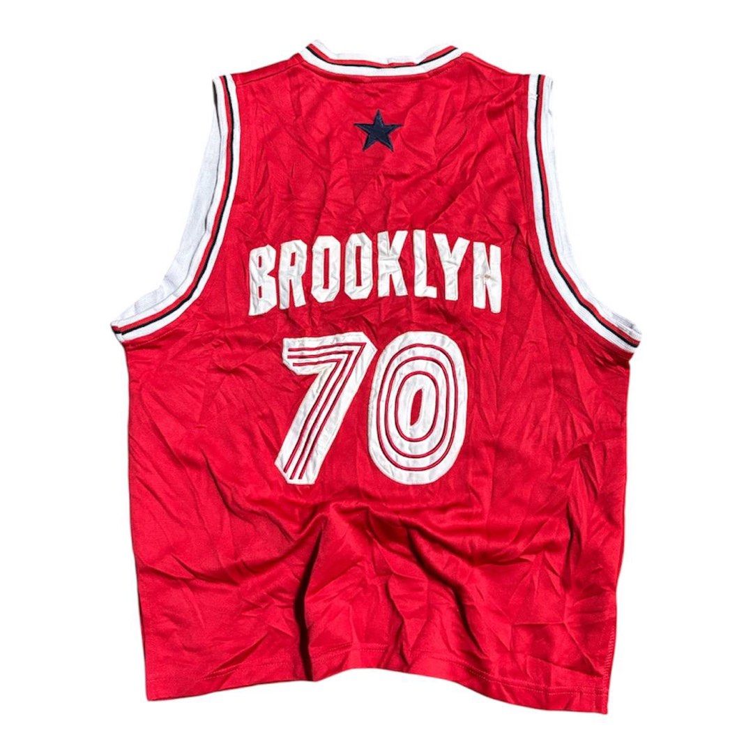 Brooklyn Xpress Basketball Jersey (Category: Activewear) located in Manila. Submitted by iro_ir0 (Listing ID 1429422896, Image 2). Description: Vintage Brooklyn Express Jersey — ( Very Hard to Find Condition ) 🏷️ + sf Width : 20.5 Length : 26.5 Issue : NONE ( Good Condition ) - Red Brooklyn Xpress basketball jersey - Features "BROOKLYN" on the front and "70" on the front and back - White and black trim - Size: M (10-12) - Material: 100% polyeste