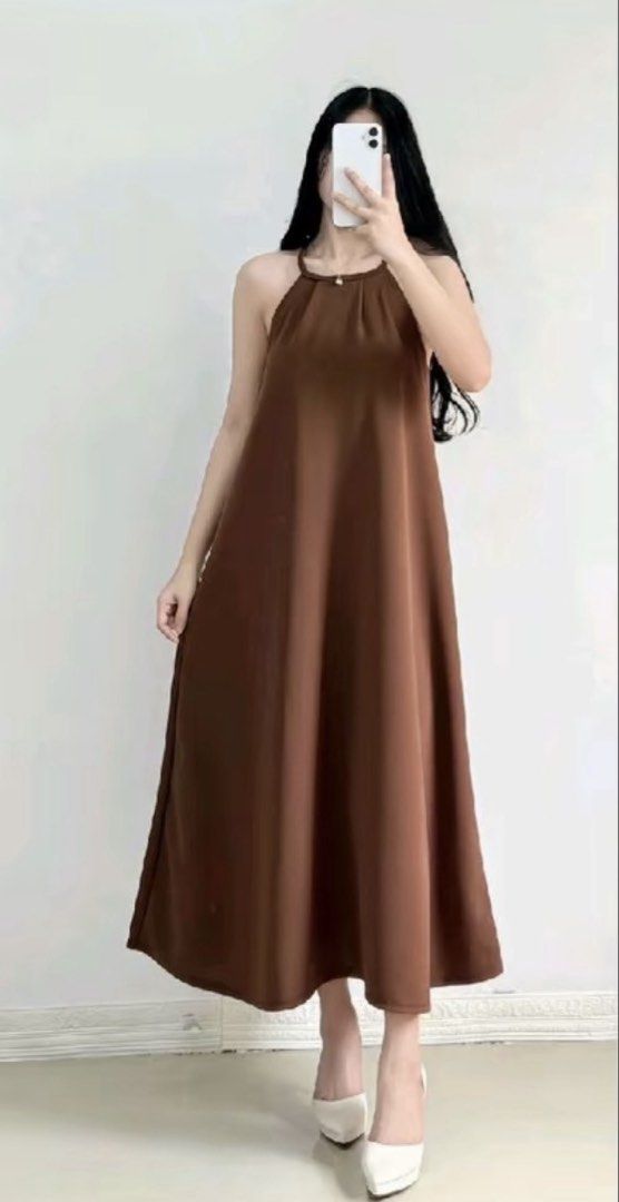 Brown Halter Neck Maxi Dress (Category: Dresses) located in Quezon City. Submitted by patbrandeditems (Listing ID 1429418250, Image 1). Description: Fits S to XXL.