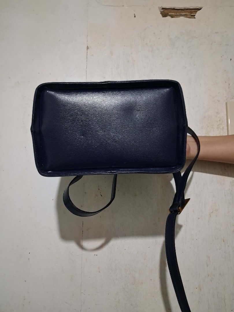 Christian Dior Vertical Shoulder Bag (Category: Luxury Bags & Wallets) located in Cebu City. Submitted by azunzionnn_ (Listing ID 1429461022, Image 3). Description: Christian Dior Vertical Shoulder Bag FLAWS: needs stitiching, minor repair, and crack sling 📌 MOP: Gcash 📌 MOD: JNT 📍 LOC: Cebu.