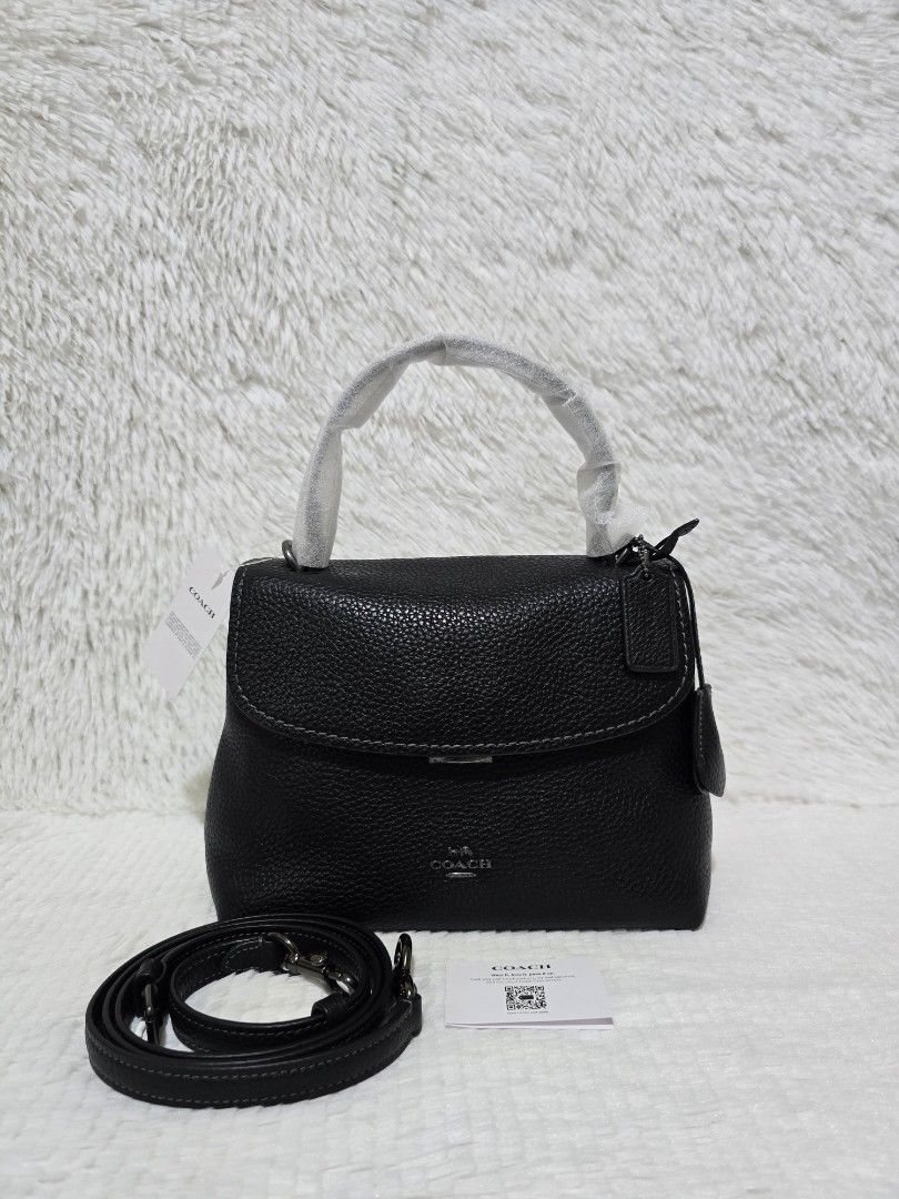 Coach Emory Black Crossbody Bag (Category: Luxury Bags & Wallets) located in Baguio. Submitted by obsessed_ph (Listing ID 1429367057, Image 1). Description: 🖤 BRANDNEW & SEALED Coach Emory Top Handle 🖤 💯 Authentic/Original Hardware condition: 10/10 Leather condition: 10/10 Material: Pebbled Leather Hardware: Gunmetal Dimensions (LxWxH): Inclusions: Adjustable sling strap Care card Tag price Retails for $498 Price: 8,490 (SUPER DEAL PRICE) For 