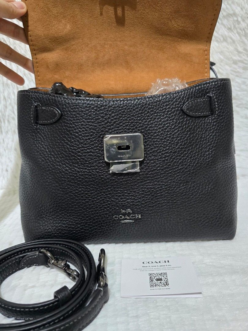Coach Emory Black Crossbody Bag (Category: Luxury Bags & Wallets) located in Baguio. Submitted by obsessed_ph (Listing ID 1429367057, Image 2). Description: 🖤 BRANDNEW & SEALED Coach Emory Top Handle 🖤 💯 Authentic/Original Hardware condition: 10/10 Leather condition: 10/10 Material: Pebbled Leather Hardware: Gunmetal Dimensions (LxWxH): Inclusions: Adjustable sling strap Care card Tag price Retails for $498 Price: 8,490 (SUPER DEAL PRICE) For 