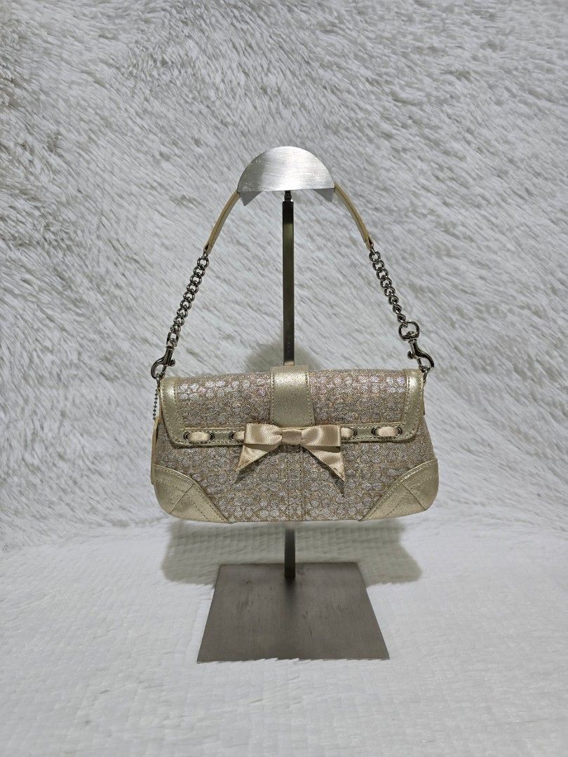 Coach Micro Soho Crystal (Category: Luxury Bags & Wallets) located in Baguio. Submitted by obsessed_ph (Listing ID 1429393062, Image 3). Description: FIXED PRICE ✨️ ULTRA RARE Vintage Coach Super Mini Soho with Crystals ✨️ 💯 Authentic/Original Body condition: 9.5/10 Hardware condition: 9.9/10 (no rust/scratches) Crystal condition: 10/10 (Complete, no missing piece) Dimensions (LxWxH): Magnet Closure Swarovski crystals Price: 20000 For more photo