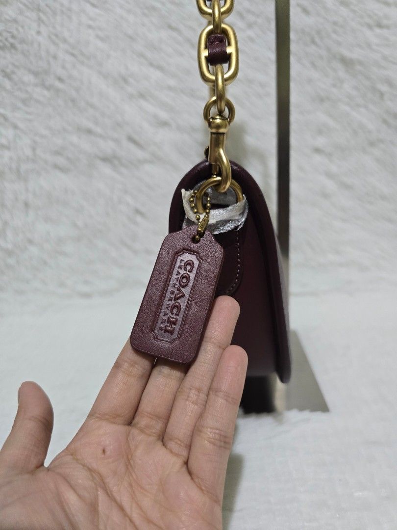 Coach Swinger Shoulder/Crossbody Bag- Regular Size (Category: Luxury Bags & Wallets) located in Baguio. Submitted by obsessed_ph (Listing ID 1429388055, Image 3). Description: 🍷 BRANDNEW Coach Swinger in Merlot - Regular Size 🍷 💯 Authentic/Original Hardware condition: 10/10 Leather condition: 10/10 Material: Original Glovetanned Leather Size: Regular (bigger than swinger 20) Dimensions (LxWxH): Zipper closure With original dustbag and care car