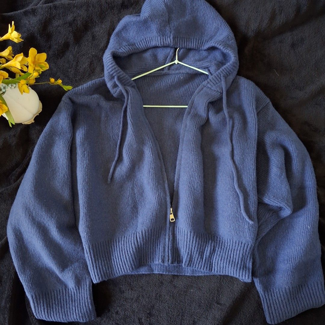 Dark blue knitted zip up hoodie (Category: Coats, Jackets and Outerwear) located in Virac. Submitted by my.styleph (Listing ID 1429359467, Image 2). Description: - Medium- large - Hood with drawstrings - Knit fabric - Versatile for casual wear and layering.