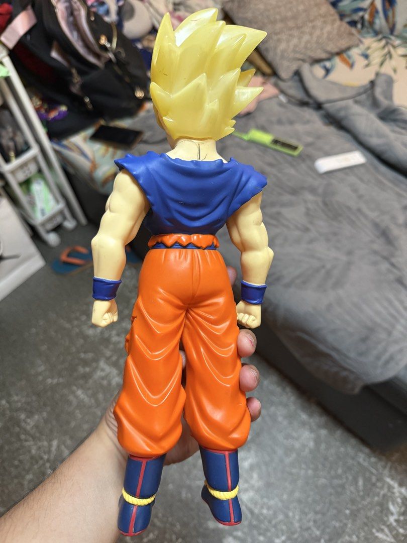 Dragon Ball Z Goku Action Figure (Category: Figurines & Statues) located in Quezon City. Submitted by kulotskiz (Listing ID 1429502929, Image 2). Description: With minor paint chips please check the pics Location: sikatuna q.c As is.