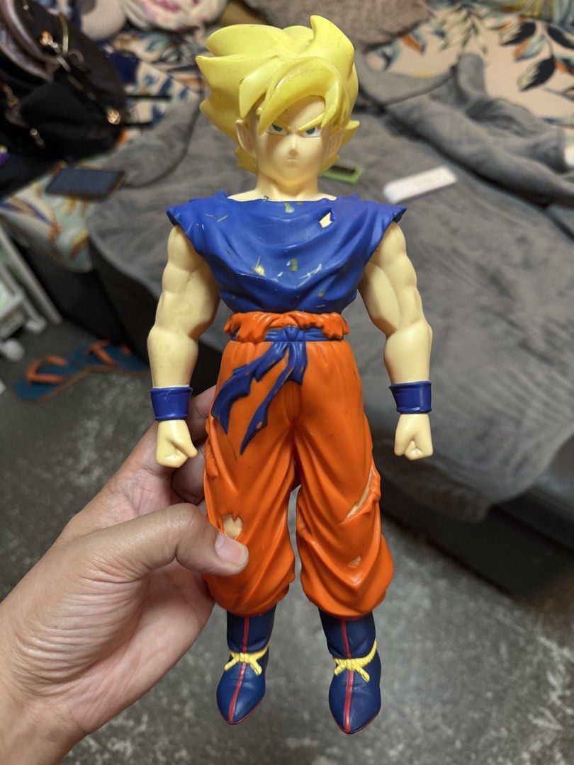 Dragon Ball Z Goku Action Figure (Category: Figurines & Statues) located in Quezon City. Submitted by kulotskiz (Listing ID 1429502929, Image 1). Description: With minor paint chips please check the pics Location: sikatuna q.c As is.
