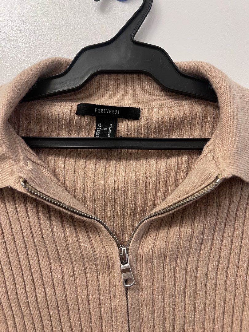 Forever 21 Nude Ribbed Knit Cardigan (Category: Others Tops) located in Manila. Submitted by lunaluvgood (Listing ID 1429406992, Image 2). Description: - Size: Small to Medium (Medium on tag) - Ribbed knit texture - Versatile brownish pink color - Authentic F21.