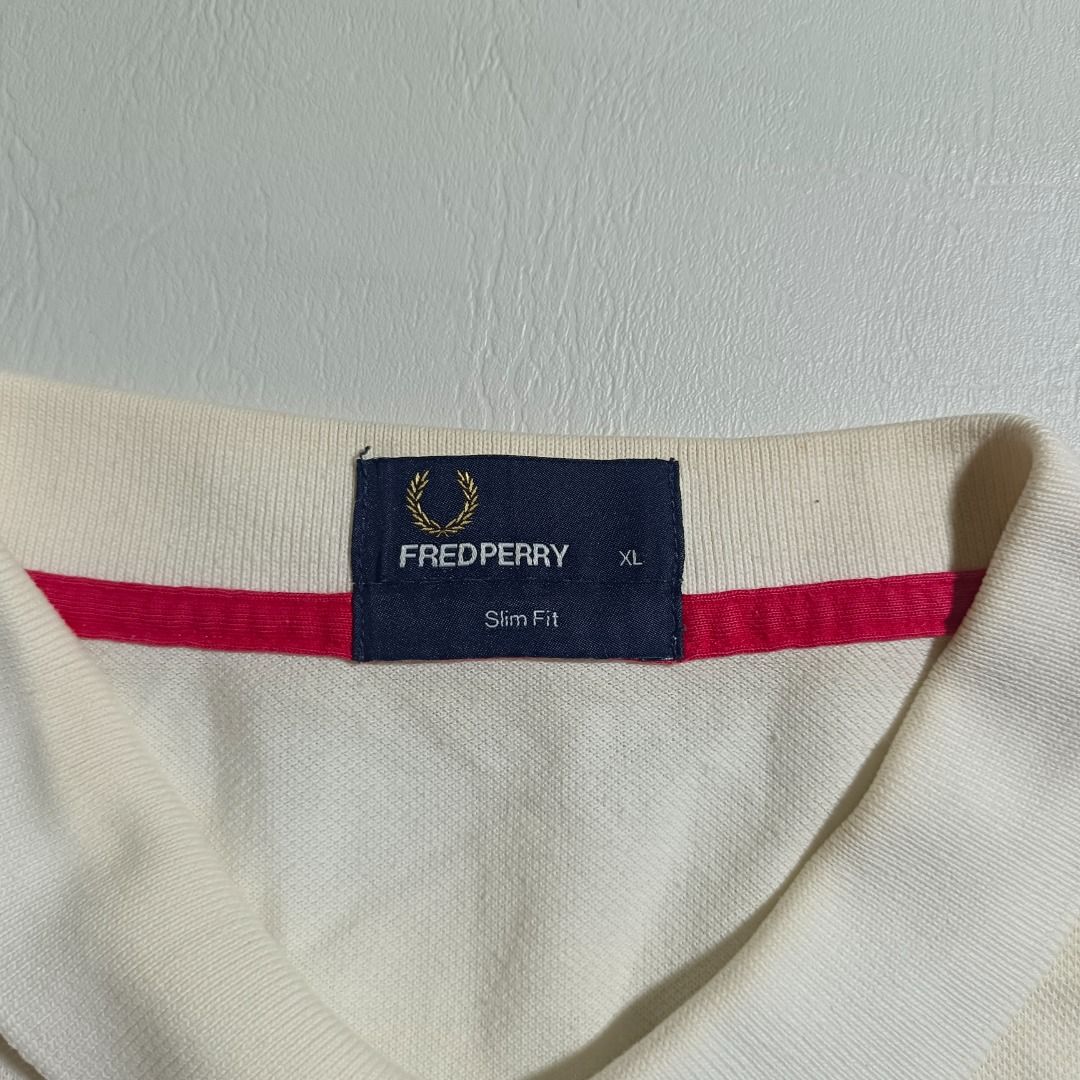 Fred Perry Poloshirt (Category: Activewear) located in Baguio. Submitted by freshmarket_2600 (Listing ID 1429473092, Image 3). Description: MINE 250 Brand: Fred Perry Tags: Complete Size: Large Dimension: L27.5W20.5 Condition: Excellent Color rate: 10/10 Color: White Issue/s: None.