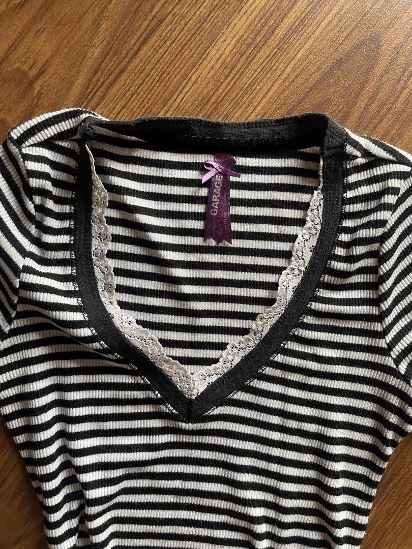Garage Striped V-Neck T-Shirt (Category: Shirts) located in Bulacan. Submitted by namisan77226 (Listing ID 1429373183, Image 3). Description: Stretchable .