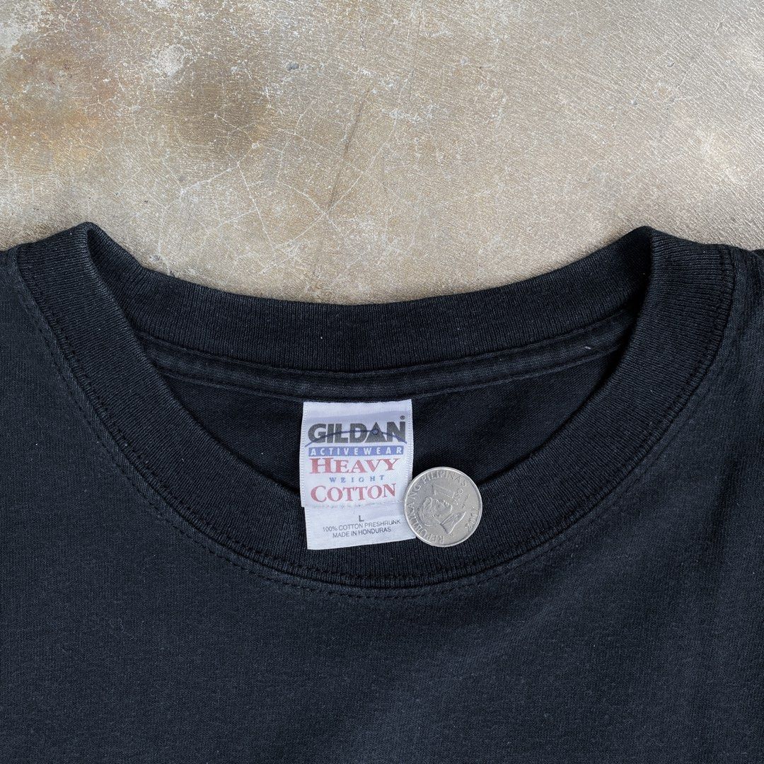 Gildan “MAN-ENOUGH” Black Raw Hem Tee (Category: Tshirts & Polo Shirts ) located in Valenzuela. Submitted by 8899locker (Listing ID 1429442609, Image 2). Description: ID: Gildan “MAN-ENOUGH” Black Raw Hem Tee Price: P500 Size: L Dimensions: 20.5” Width x 25” Length All sales are final..