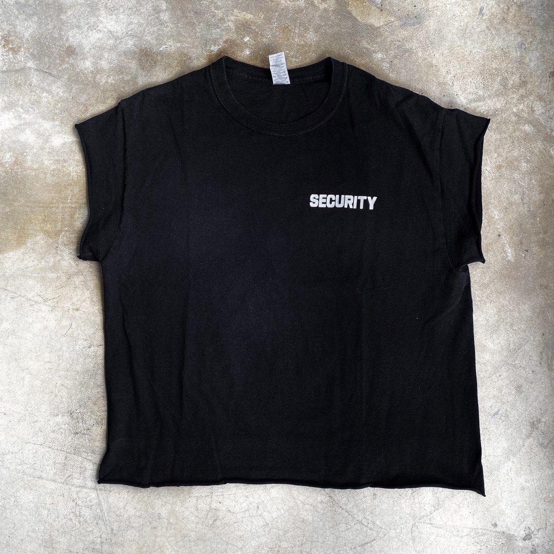 Gildan SECURITY Raw Hem/Sleeve Black Tee (Category: Tshirts & Polo Shirts ) located in Valenzuela. Submitted by 8899locker (Listing ID 1429442946, Image 3). Description: ID: Gildan SECURITY Raw Hem/Sleeve Black Tee Price: P500 Size: L Dimensions: 21” Width x 24” Length All sales are final..