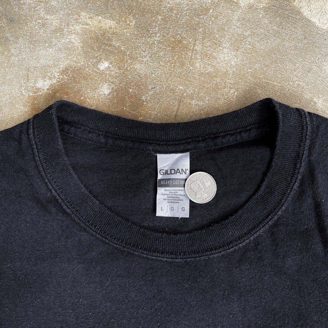 Gildan SECURITY Raw Hem/Sleeve Black Tee (Category: Tshirts & Polo Shirts ) located in Valenzuela. Submitted by 8899locker (Listing ID 1429442946, Image 2). Description: ID: Gildan SECURITY Raw Hem/Sleeve Black Tee Price: P500 Size: L Dimensions: 21” Width x 24” Length All sales are final..
