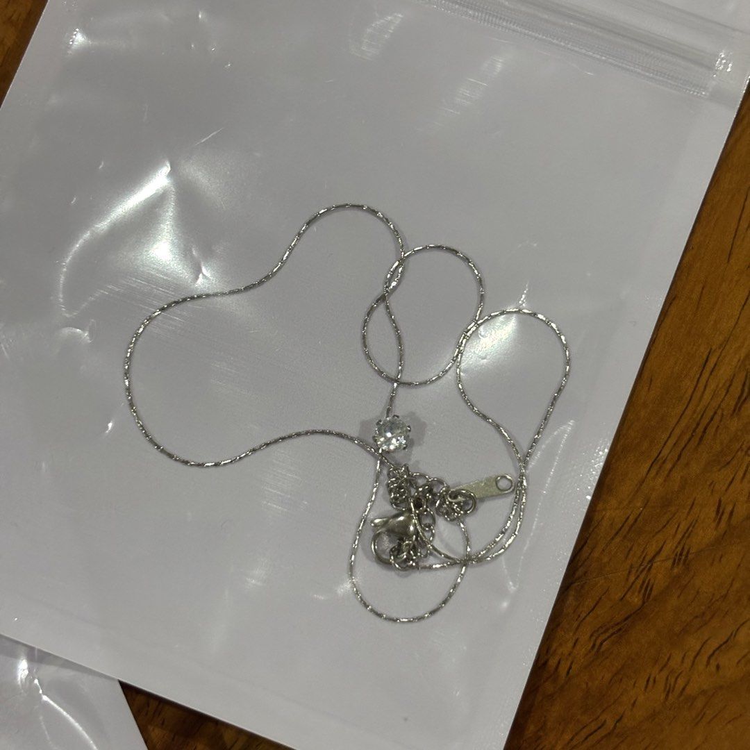 Gold Charm Bracelet + Silver Diamond Pendant (Category: Bracelets) located in Quezon City. Submitted by closetpg (Listing ID 1429472315, Image 3). Description: Buy 2 for ₱200 Each priced at ₱100 .