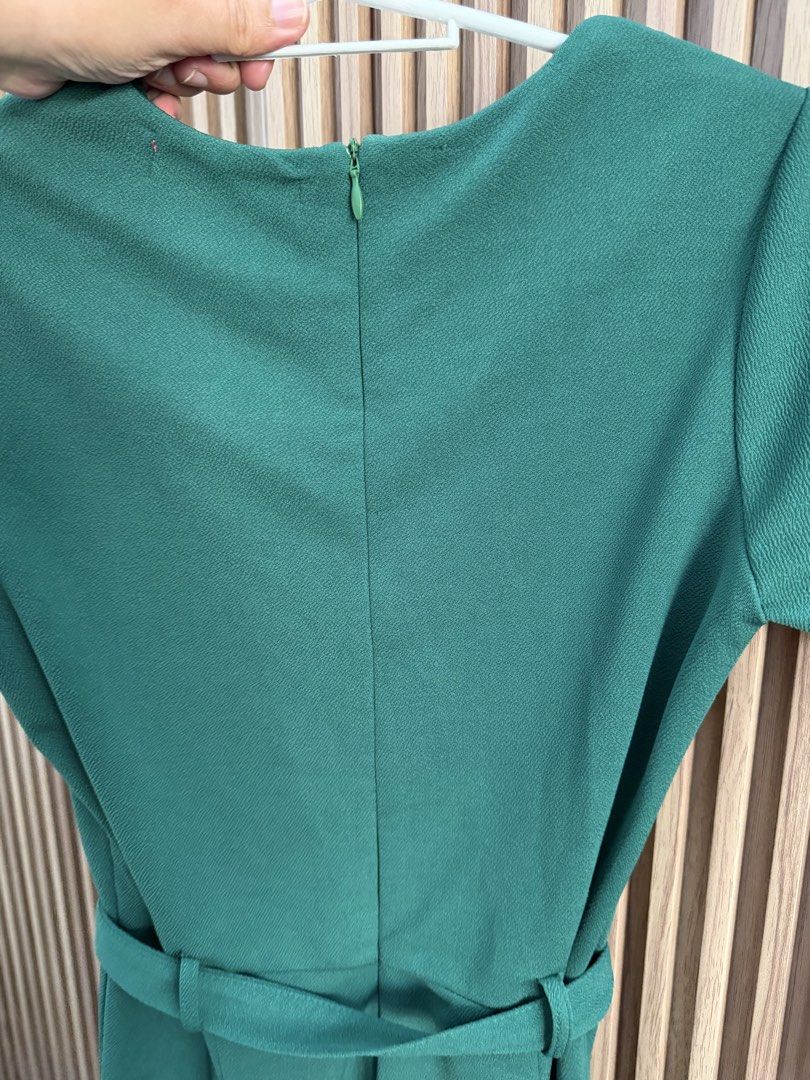 GTWFAB Green Wrap Dress - Size S (Category: Dresses) located in Las Pinas. Submitted by nothingover300 (Listing ID 1429398356, Image 3). Description: GTWFAB dress features a flattering wrap design in a vibrant green color. It includes a matching belt to cinch the waist. The dress has short sleeves and a V-neckline. The size is small (S)..