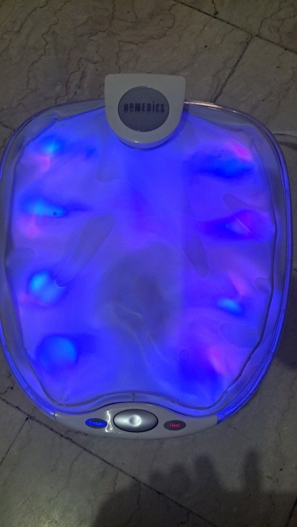 Homedics Float Massaging Waterbed Foot Spa (Category: Massage Devices) located in Manila. Submitted by gentlewolf.dc10 (Listing ID 1429389128, Image 3). Description: Relax your feet with this Homedics Float Massaging Waterbed Foot Spa. It features a massaging waterbed for the feet and has multiple light settings. The spa comes with its original box. It has a white exterior with a control panel. The power cord is These Trusole sandals feature a gl