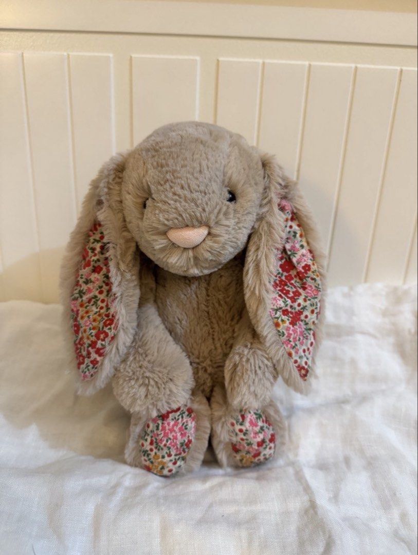 Jellycat Medium Beige Posy Floral Bunny (Category: Plushies & Soft Toys) located in Manila. Submitted by cgyu._ (Listing ID 1429494821, Image 1). Description: well loved washed & groomed! comes w free ribbons ~ 💛.