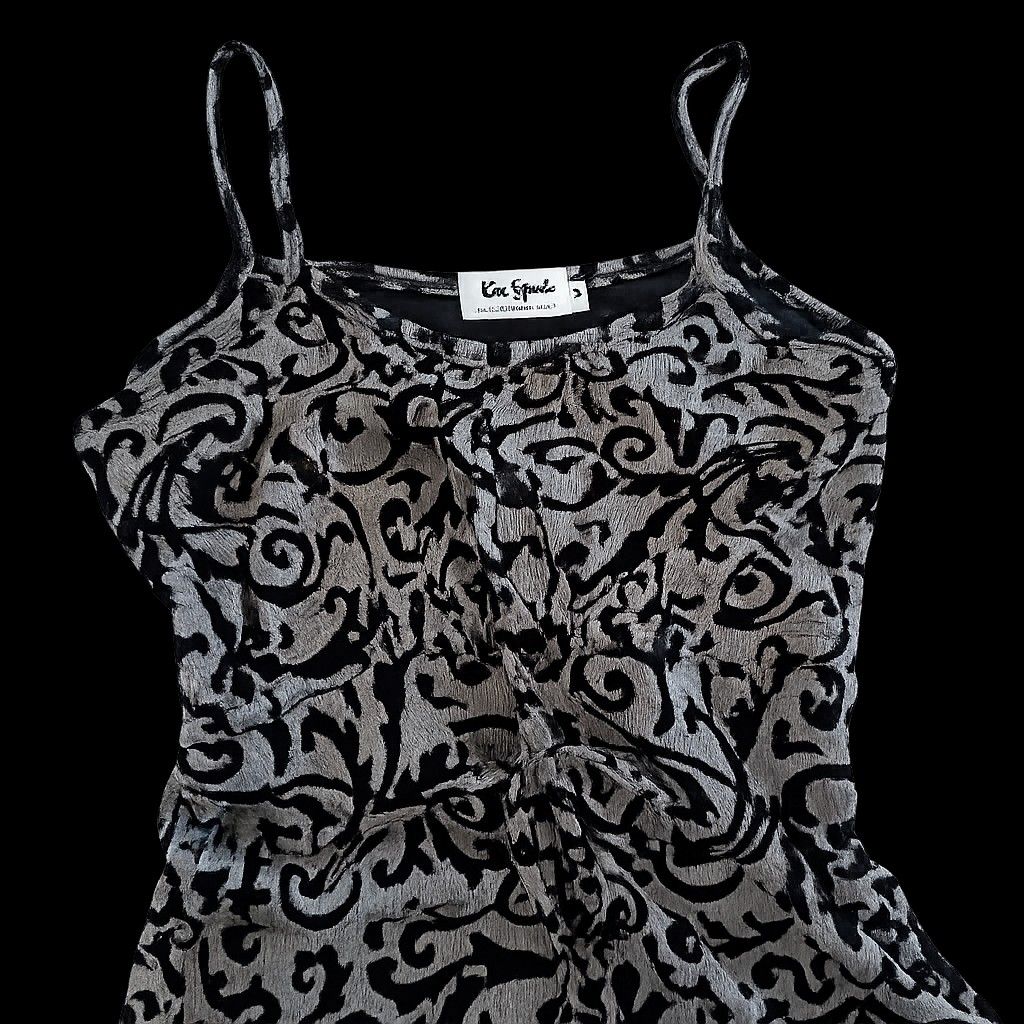 Kai Sparte Straight Dress (Category: Dresses) located in Bacoor. Submitted by pamelott (Listing ID 1429343118, Image 2). Description: Design: Straight-cut, relaxed silhouette that falls loosely from the bust down Straps: Thin spaghetti straps for a light, airy feel Neckline: Soft scoop neckline Pattern: Elegant black swirling vine or scroll pattern over a light gray base Length: Appears mid-calf to ankle length (depending on height) Fabric feel: 