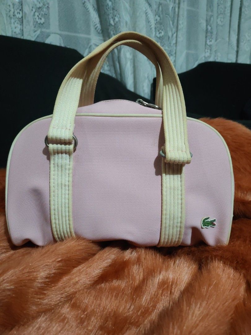 Lacoste New Classic 26 Handbag (Category: Luxury Bags & Wallets) located in Paranaque City. Submitted by princessitems (Listing ID 1429473267, Image 3). Description: Authentic Lacoste handbag. Features a striped green and white interior lining. The model is New Classic 26, and the color is Candy Floss. The bag has a Lacoste logo inside. The bag's style is a classic design, perfect for everyday use..