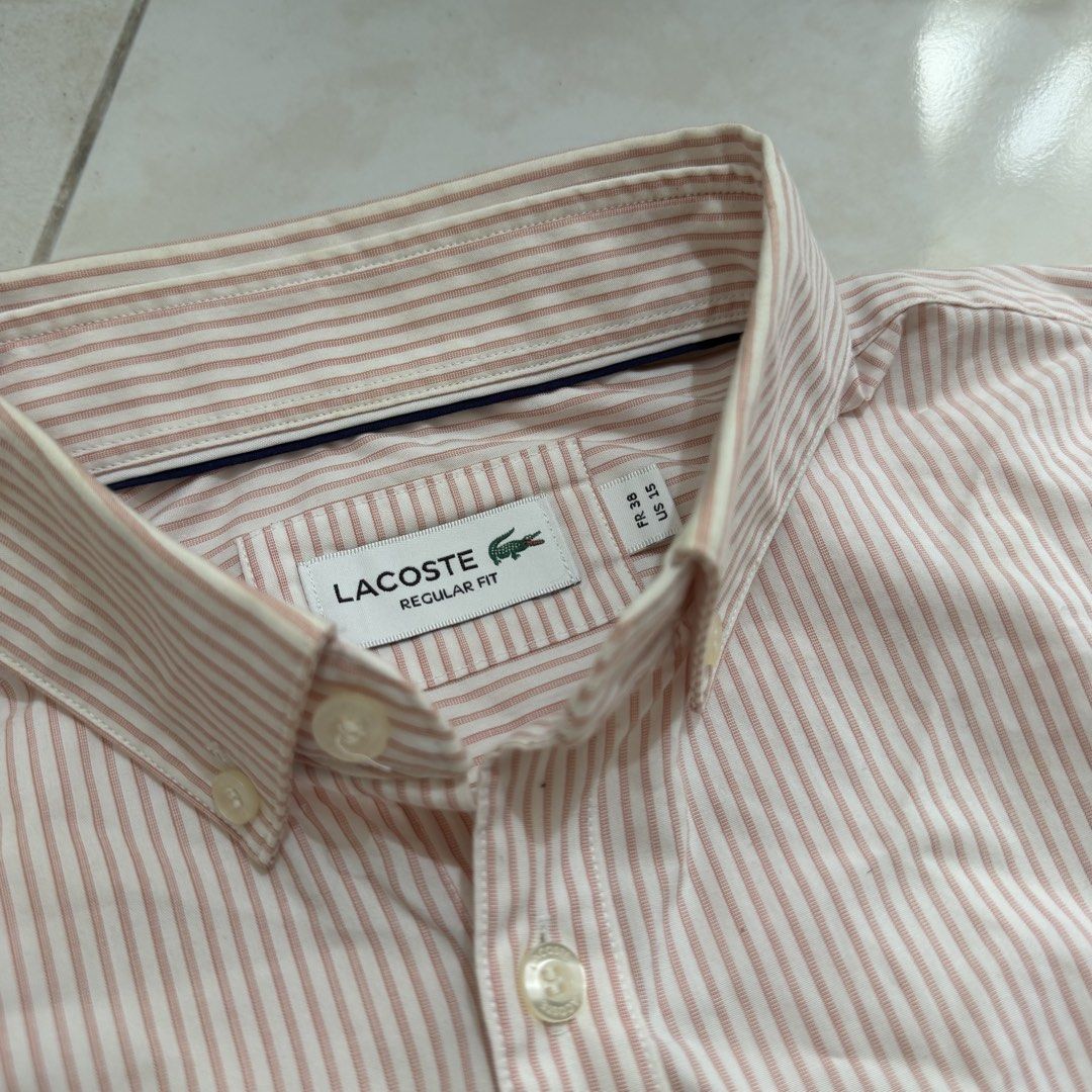 Lacoste Regular Fit Striped Shirt Button up Polo (Category: Tshirts & Polo Shirts ) located in Manila. Submitted by jxuerae (Listing ID 1429371899, Image 2). Description: Pink Lacoste Button-up Polo 27x28 Issue: Pin holes, Stain 📍Loc: San Juan, Metro Manila Via lalamove/J&t.
