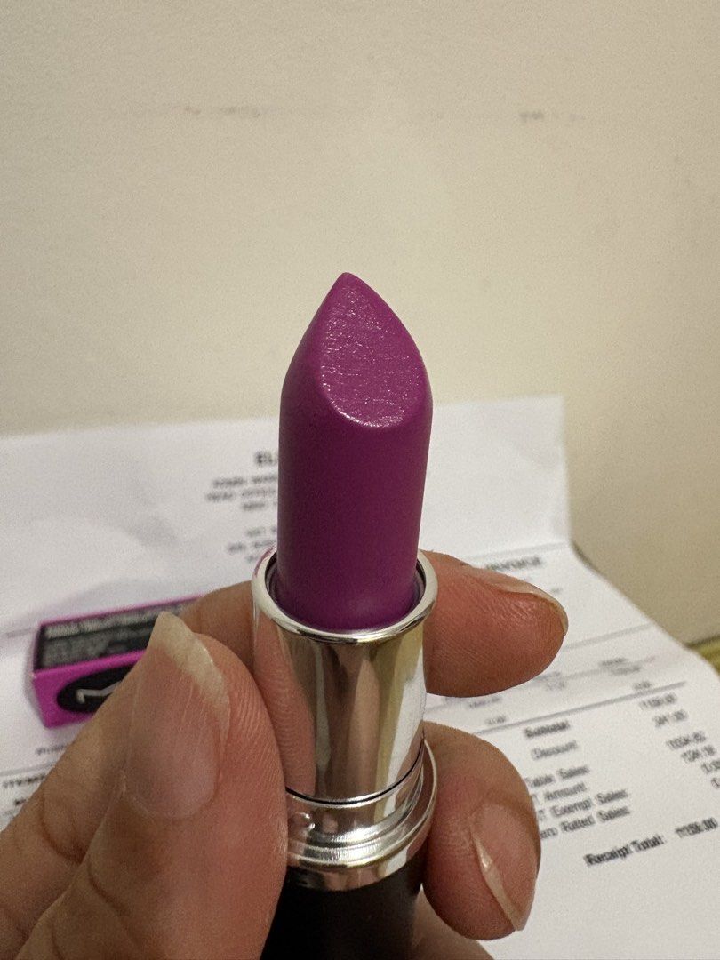 MAC Maximal Sleek Satin Lipstick - Violet Vapor (Category: Makeup) located in Quezon City. Submitted by iris.edit (Listing ID 1429432076, Image 3). Description: Authentic MAC Maximal Sleek Satin Lipstick in Violet Vapor. Made in Italy. The lipstick is a vibrant purple shade. Comes with the original box and receipt from ELC Beauty Inc. The receipt shows the original price of 1159 after discount. Just opened on March 31, 2026 Swatched only, not my 