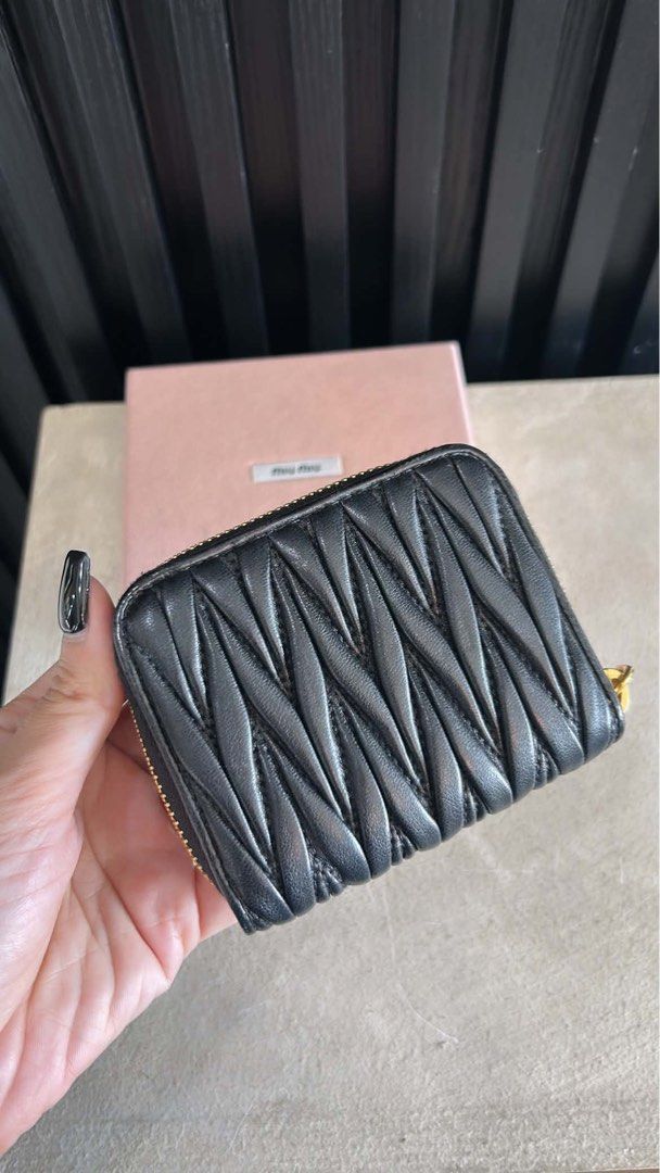 Miu Miu Matelassé Zip Wallet (Category: Luxury Bags & Wallets) located in Manila. Submitted by bagsdetails27 (Listing ID 1429380792, Image 3). Description: Miu Miu Matelasse Coin Purse In Nappa Leather Preowned. Rank 9/10 Comes with box & cards 14,500.