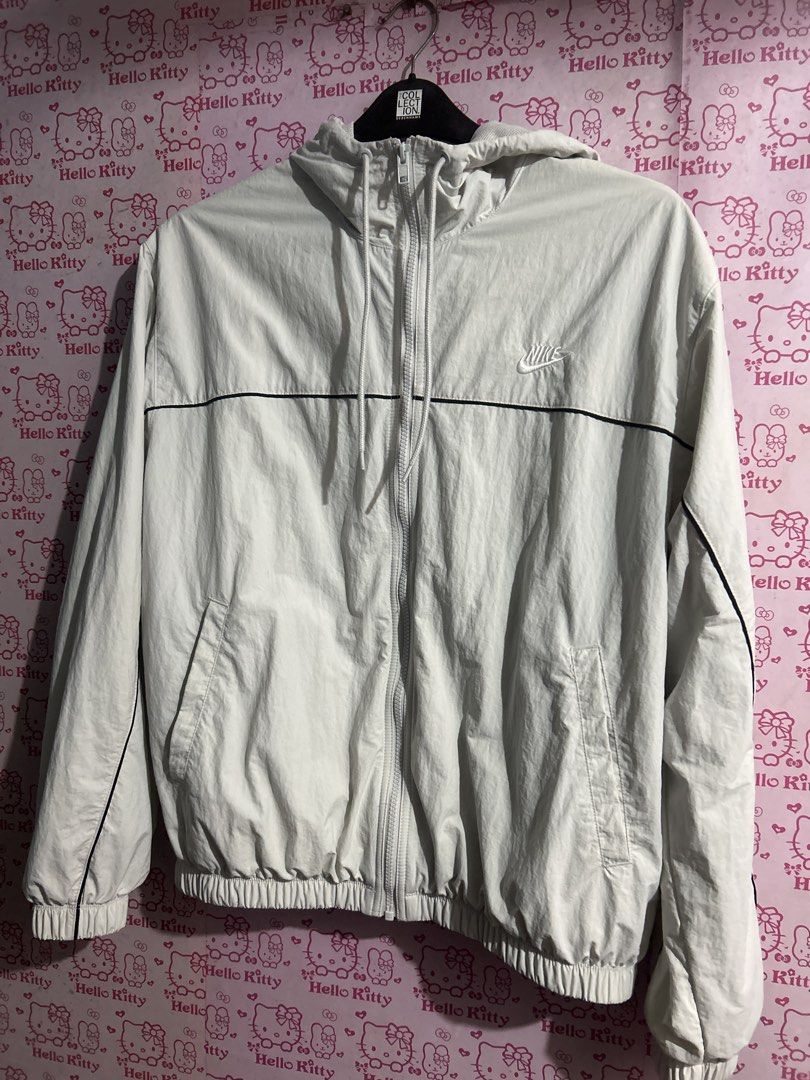 Nike Lightweight Jacket with Hood (Category: Coats, Jackets and Outerwear) located in Manila. Submitted by hellokitty_21 (Listing ID 1429453517, Image 1). Description: Nike mens jacket, large, original .