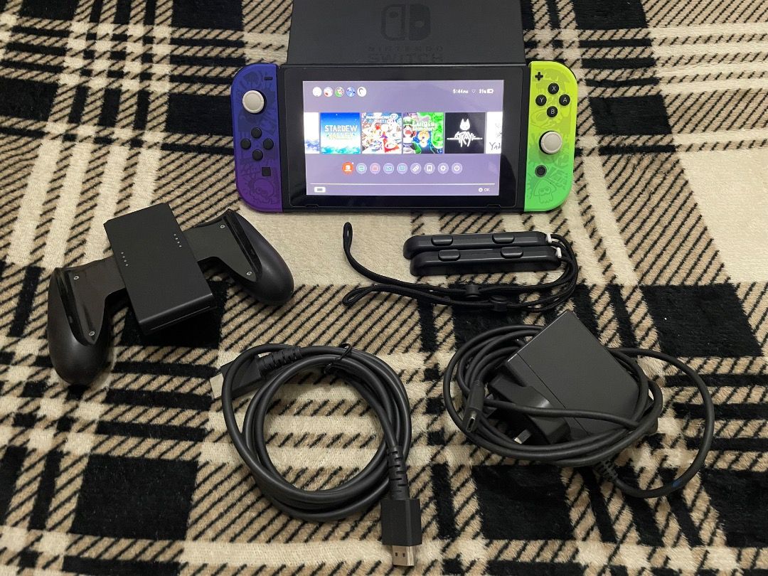 Nintendo Switch V1 JB w/ Box (Category: Nintendo) located in Angono. Submitted by pricefield4ever (Listing ID 1429396087, Image 1). Description: Nintendo Switch V1 Unpatched JB w/ Box • 128GB (with games) • Complete accessories – Dock, HDMI, original charger – Joycon straps (nasa original plastic) • 9.5/10 condition smooth body • With tempered glass • No issues • Pristine Condition Swap: offer nalang COP or pick up 📩 PM if interested.
